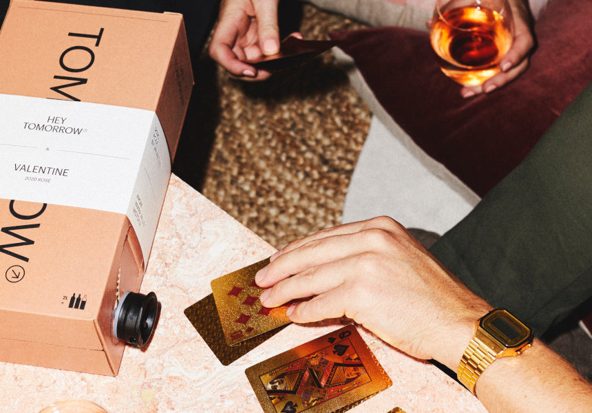 Image shows people playing cards whilst drinking Hey Tomorrow & Valentine 2020 Rosé  Bag in Box BIB  sustainable wine